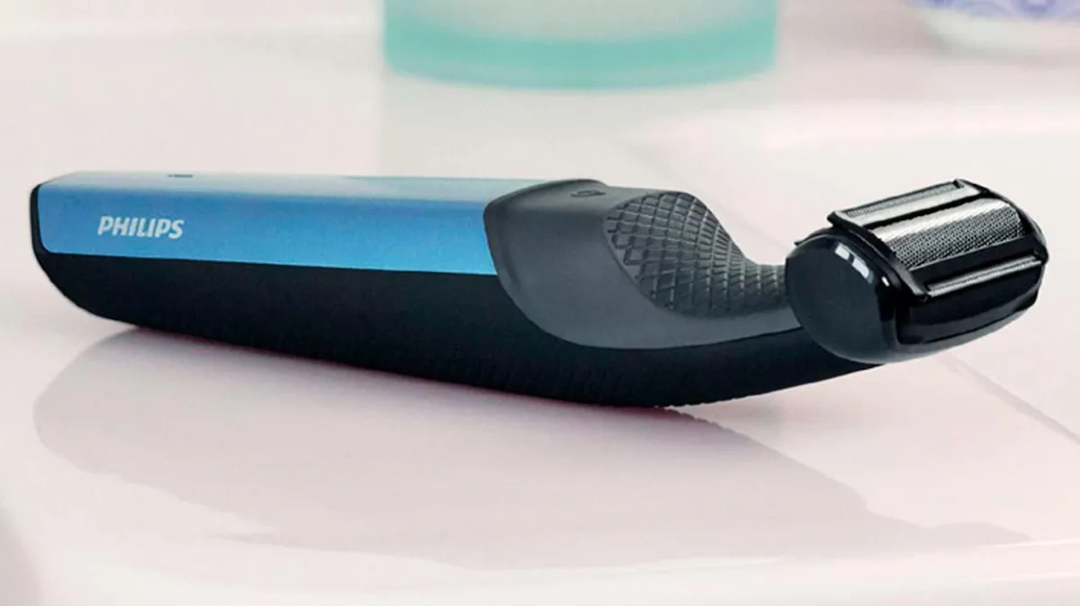 Cabezal de lámina de la Philips BodyGroom serie 3000 con el peine guía montado