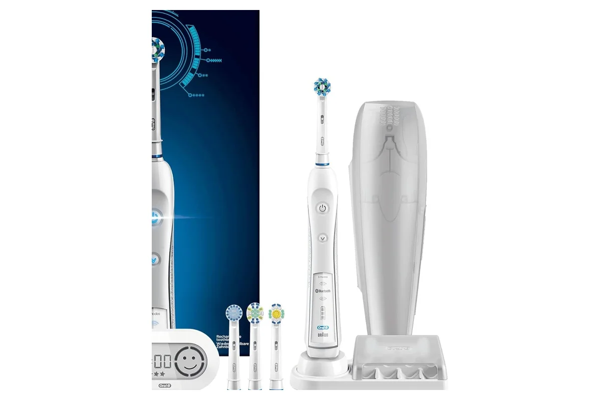 el oral-b 6000 con su base, los cabezales y el estuche de viaje